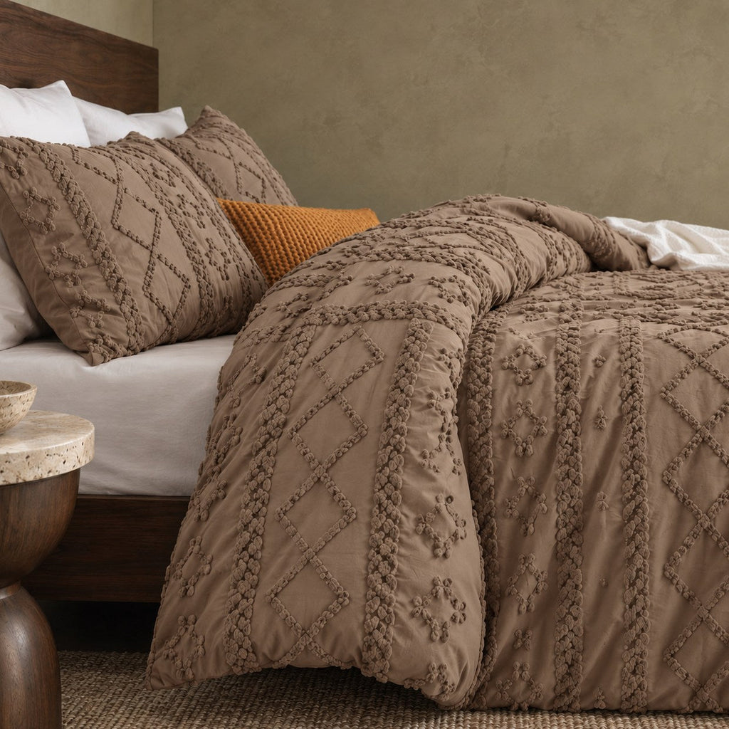 Tufted comforter detail, Brown