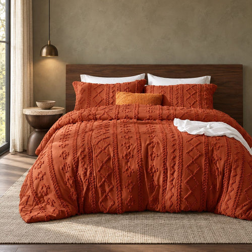 Caramel tufted comforter set on a bed