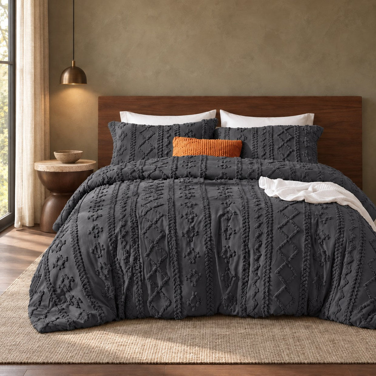 Dark Grey tufted comforter set on a bed