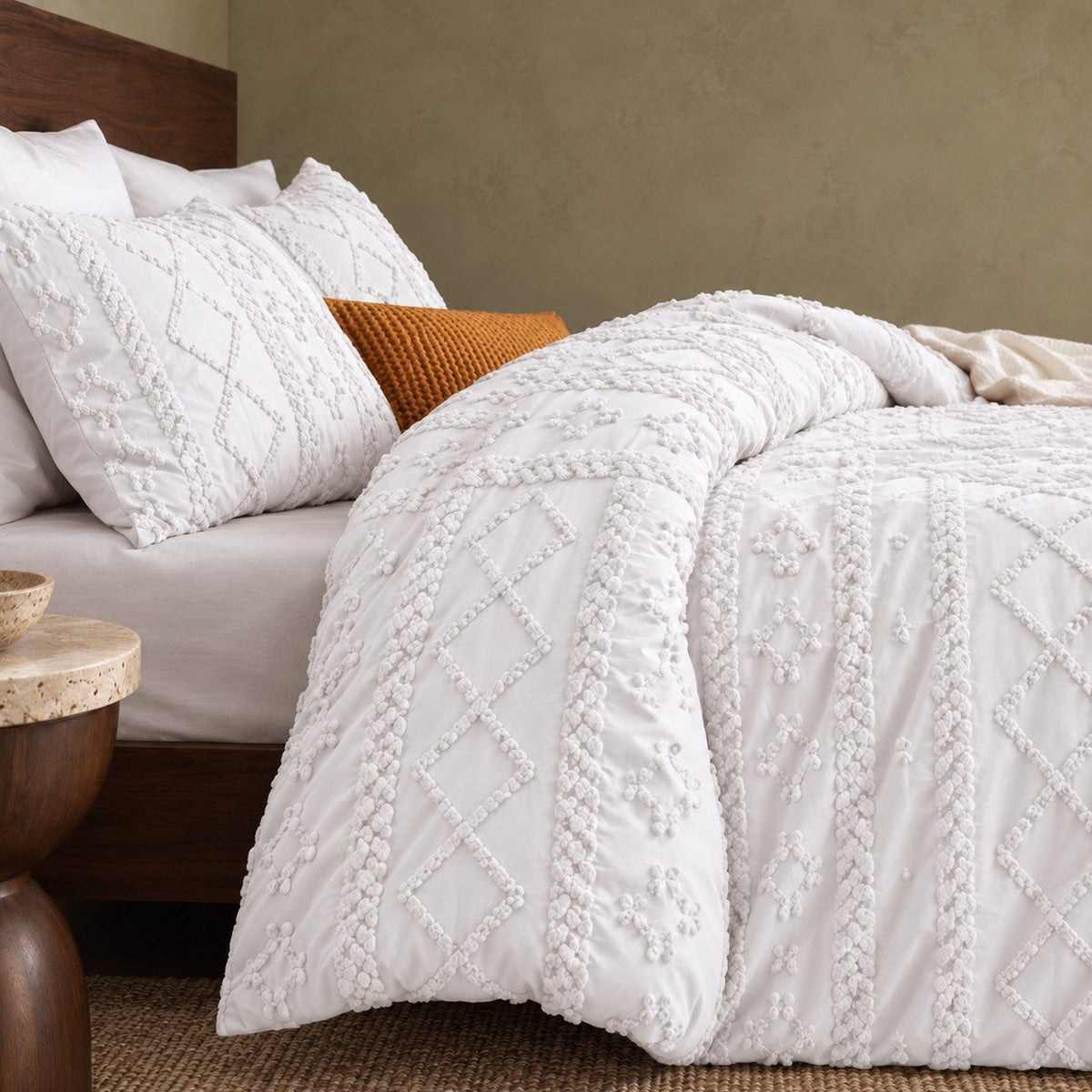 Tufted comforter detail, White